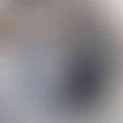 A spiral like art work commissioned by art consultants Artelier. The wood design has intricate wood carvings etched into it.