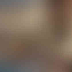 A wood art commission showing a feature wall of carved wood for a hotel project.