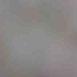 A grey natural wood sculpture, typically used as an office, hotel or bedroom feature wall.