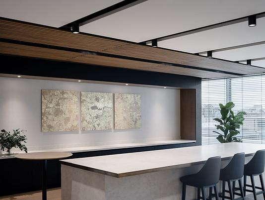 a triptych trio of artworks in gold leaf of london maps in detail in situ in a corporate workspace in st pauls london for a project by ewan eason