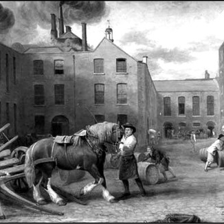 A black-and-white 'vintage' photograph showcasing horses and horsemen as a depiction on London's industrial work in the mid-twentieth century.