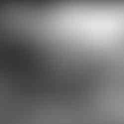 A black-and-white 'vintage' photograph showcasing horses and horsemen as a depiction on London's industrial work in the mid-twentieth century.