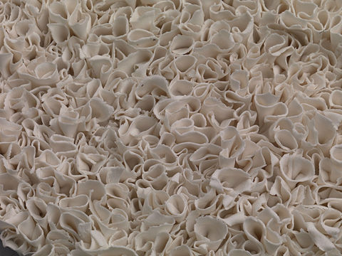 close up of artist wall technique commissioned by artelier made from layered ceramics