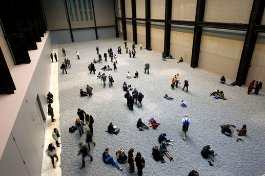 weiwei sunflower seeds exhibition in tate modern in 2010, featuring people walking over millions of seedsPhotography by Lux & Jourik