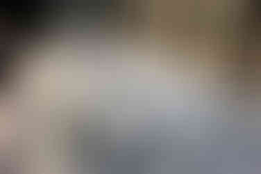 weiwei sunflower seeds exhibition in tate modern in 2010, featuring people walking over millions of seedsPhotography by Lux & Jourik