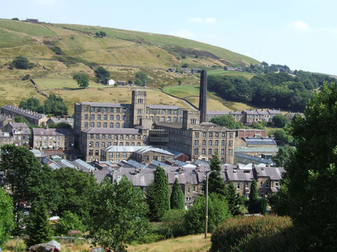 yorkshire mills with a valley backdrop