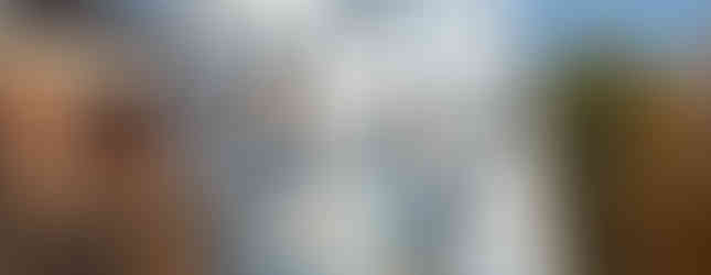 © Photo by Summonedbyfells showing a large contemporary art bottle made from thick metallic abstract interconnected fonts and letters