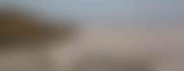 37. © Courtesy of Barcroft Media showing a spiral artwork set in the middle of the sand on a moody lit beach