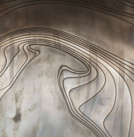 close up of artist wall technique commissioned by artelier made from bronze