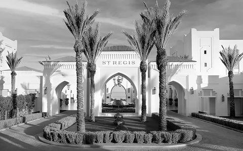 outdoor shot of entrance to st regis resort hotel in tamouda bay, morocco