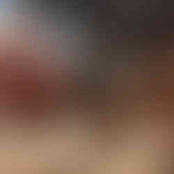 Close up Timber artist Wycliffe Stutchbury working with his hands on an art piece in his UK-based studio