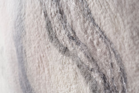 close up of artist wall technique commissioned by artelier made from layered felt and textiles