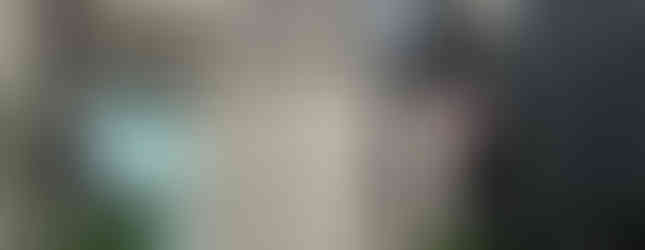 33. © Photo by Youtuber via Flickr showing a large clothing pin art installation in the middle of a corporate space of buildings in Philadelphia