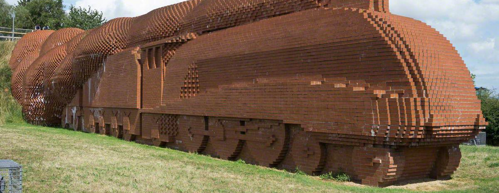 large contemporary train sculpture made out of metal