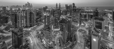 An outdoor image of dubai, uae at night in black and white