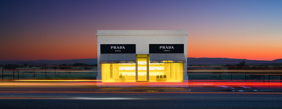 34. © Photo by Stephen A.Masker showing a prada building in the middle of the desert in a sunset setting