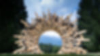 Jae hyolee's wooden installation displayed in northern italy in outdoor art sculpture, a contemporary art sculpture in a semi circular arched shape made of wood with background of mountains