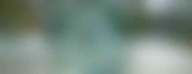 59. © Courtesy of art@site showing a glass box enclosing a cloud in an urban space backdrop