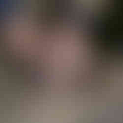 Timber artist Wycliffe Stutchbury working with his hands on an art piece in his UK-based studio