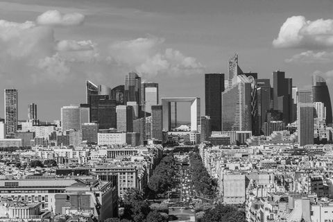 An outdoor image of paris with la defense building centre in the middle