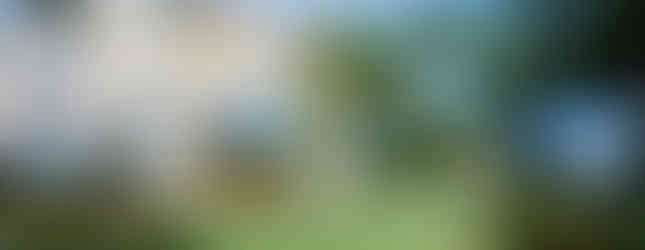 © Photo by Ted Mcgrath showing 5 mettalic large sphere balls in singapore as part of a contemporary art installation