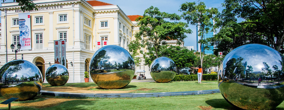 © Photo by Ted Mcgrath showing 5 mettalic large sphere balls in singapore as part of a contemporary art installation