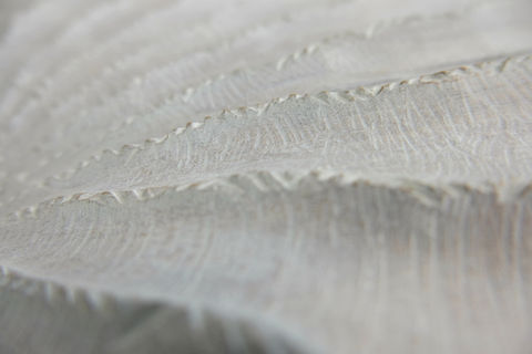 close up of artist wall technique commissioned by artelier made from carved wood