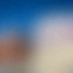 © Vhils's public art display next to an industrial factory where his coca cola / portrait collage is fixed on a circular dome