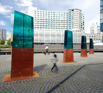 a job commissioned for danny lane in paddington london featuring 4 glass artwork installations with a copper base as a child runs through them