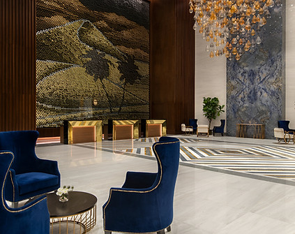 Commissioned large scale feature wall for a hotel reception lobby by artist Giles Miller studio