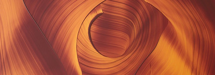 orange and burnt-red artwork showcasing liquid-like brushstrokes centreing towards the cylinder-like middle.