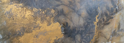 gold leaf and blue hazy artwork showcasing natural forms including a faint tree on the right