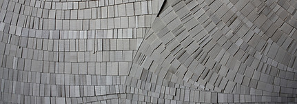 white pale wood artwork in a mosaic style with a multidude of small white wood pieces making up the wood artwork sculpture.