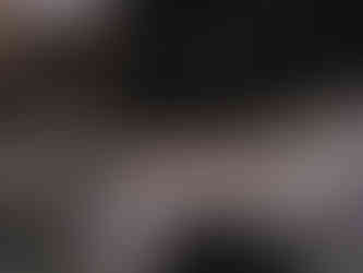 A close-up detail of famous public art: Rodin's 'The Thinker'. Closeup shows Rodin's signature, embedded into the bronze sculpture cast.