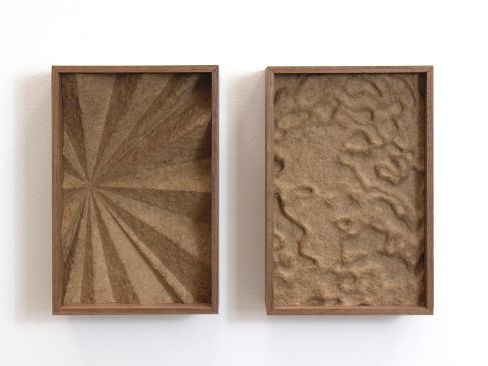 This contemporary wall sculpture portrays sustainable material in a bas relief medium.