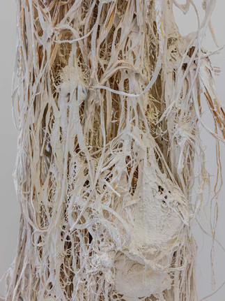 A close-up of a contemporary artwork in plaster and wood ready for art investment.