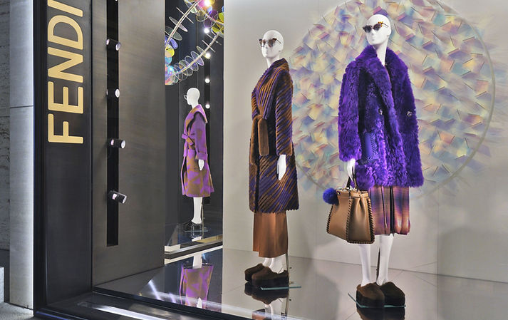 chris wood commission for shop window front for fenty, featuring 3 mannequins in fur coats and chris wood's dichrois wall glass installation, consulted by advisory service artelier