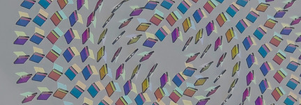 multiple glass artwork pieces set in a circular format