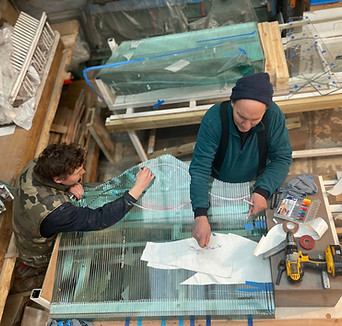 featuring the artist danny lane doing a commission for a public art project by artelier, including his workshop assistant taken at birds eye level