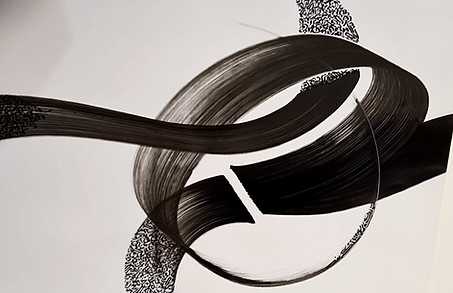 detailed shot of black and white ink calligraphic piece inspired by arabic writing commissioned by artelier