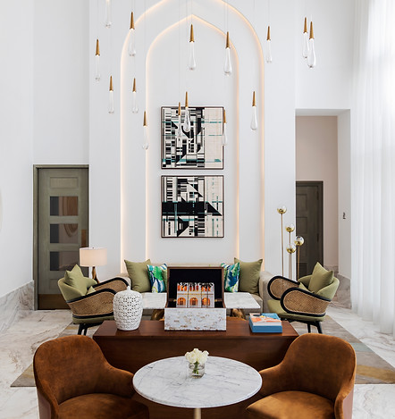 Matthias De Vogal's woven abstract canvases in black, blue and white in situ at raffles al areen palace in the lounge entrance room