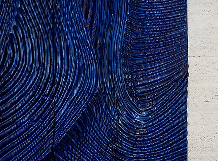 A cyan blue close up image detailing the curves, indents an engravings made by Benoit Averly for one at palm, jumeirah, dubai