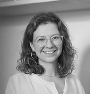 senior art curator Alina Young's portrait in black and white