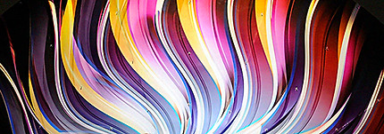 blue, purple, pink, orange and yellow circular artwork with a darkened male figure set in front of the 3D wall artwork