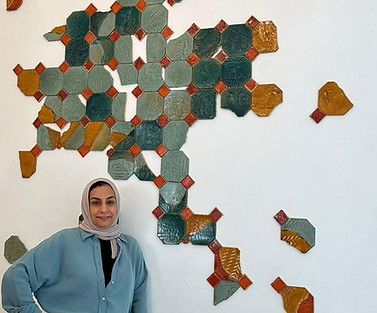 example of Art Procurement & Commissions managed and handled by artelier art consultancy featuring a local bahraini female artist with her custom ceramic tile feature wall piece
