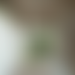 Wooden feature wall for bathroom, showing three wooden panels in a geometric wood art design.