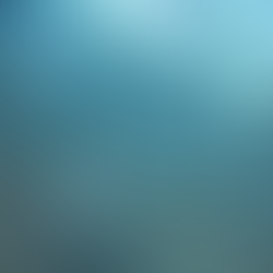 A bespoke blue verre églomise feature wall with cracks and light shimmering off it