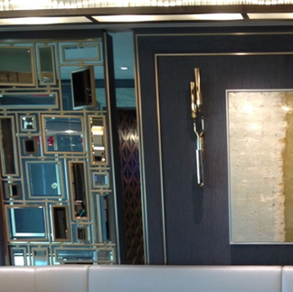 A blue and gold leaf etched verre eglomise art style, made for a client who required a unique modern mirrored wall art.