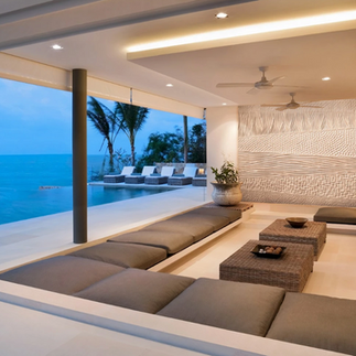 A carved wood wall art, that encompasses a geometric wood art design, with elements of bas relief.