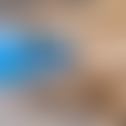 A carved wood wall art, that encompasses a geometric wood art design, with elements of bas relief.